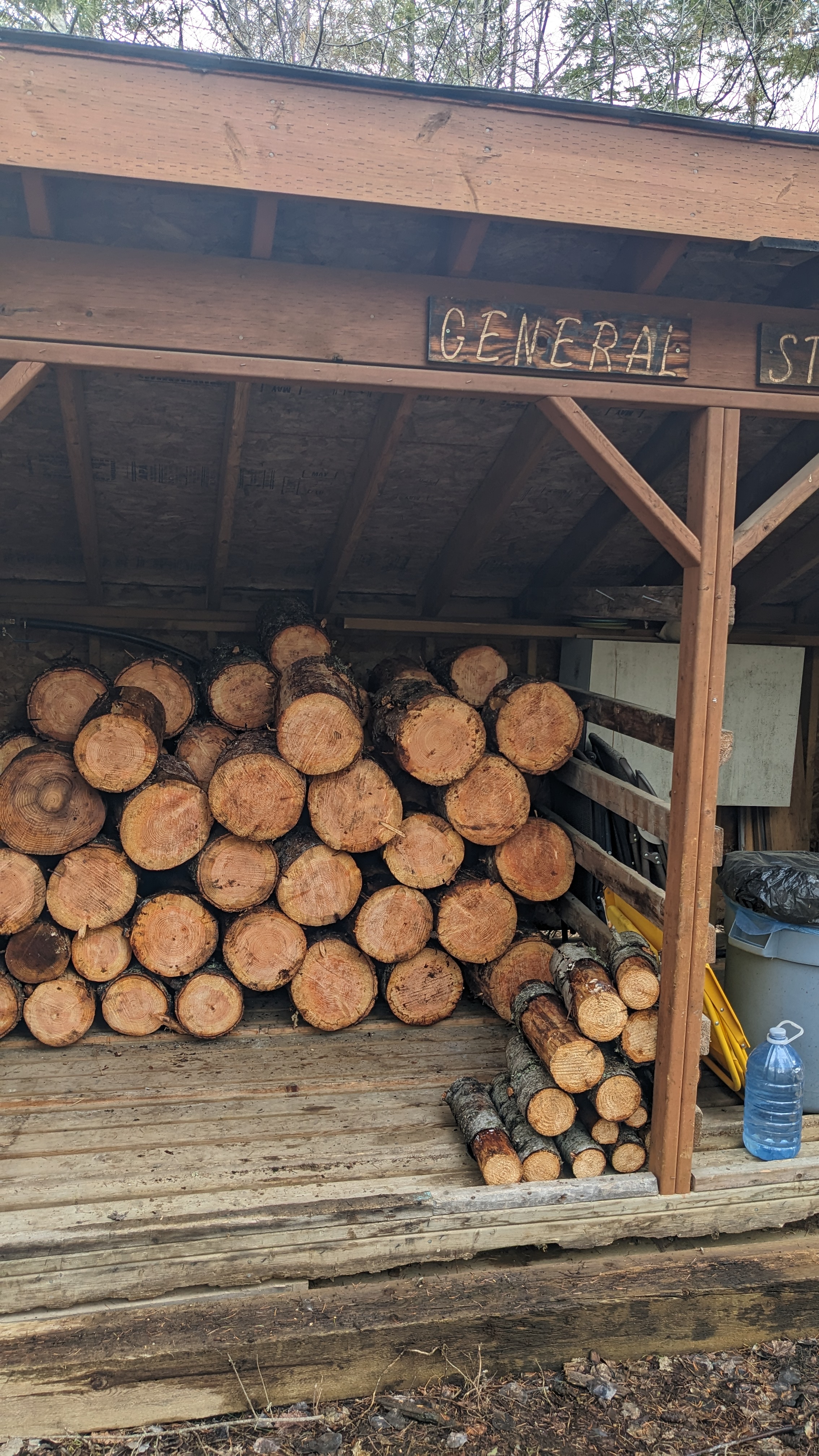 Wood shed with water taps